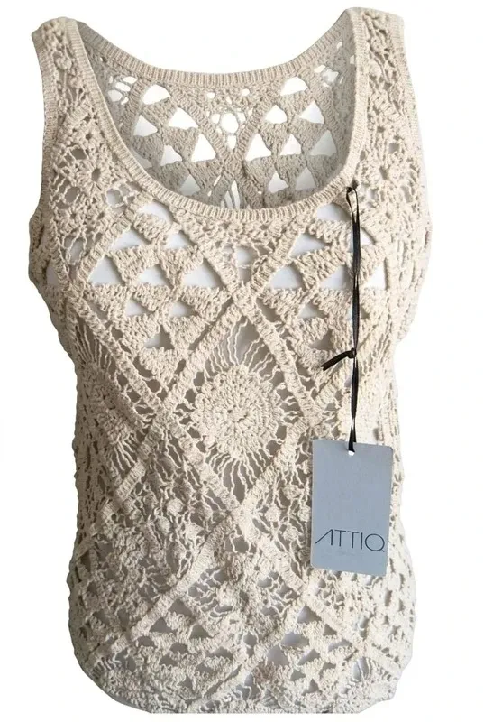 Attiro Blusa de encaje marfil sin mangas