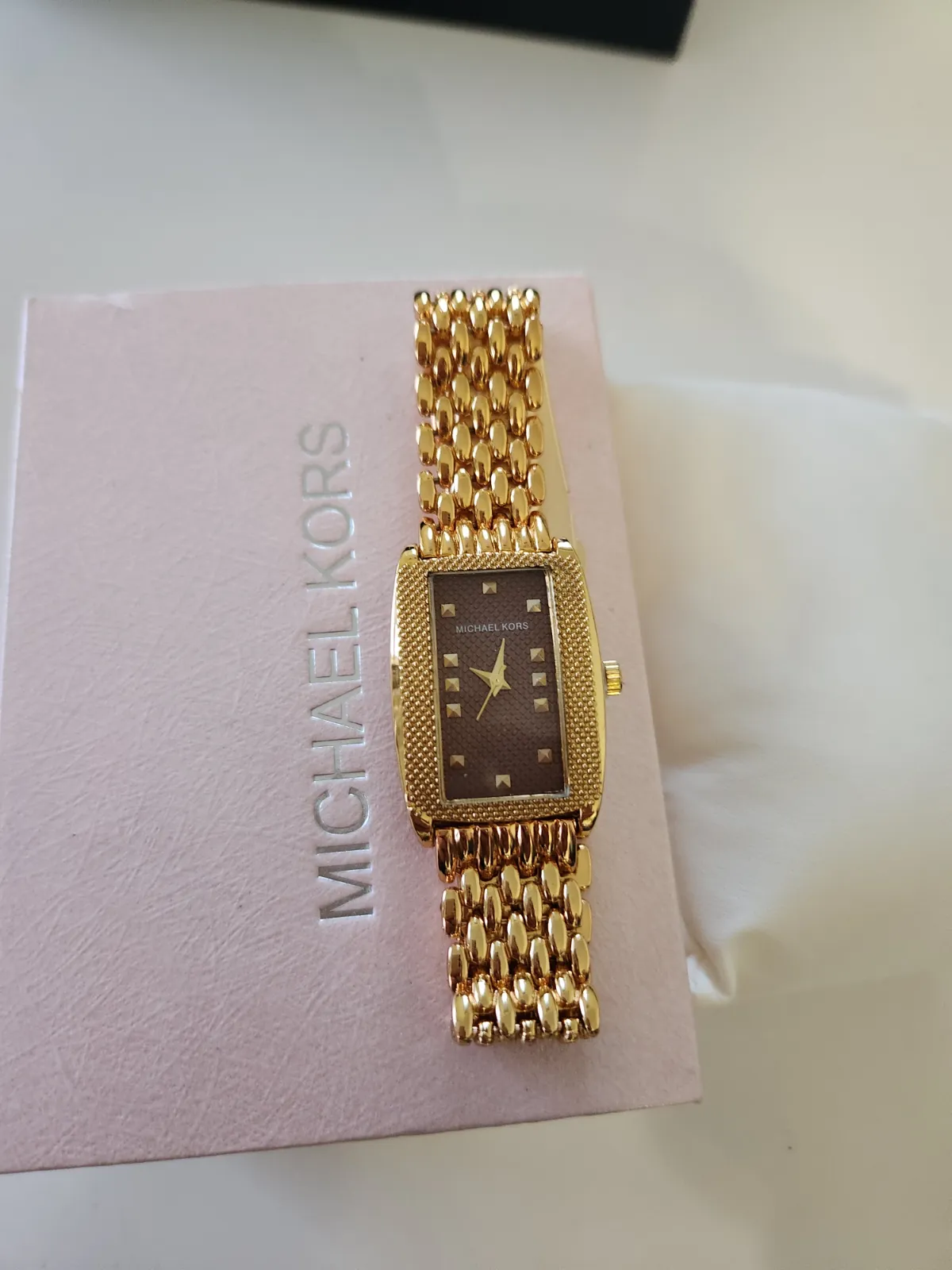 Montre Michael Kors dorée cadran chocolat 5