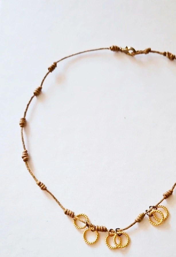 Boho knotted necklace · Coin charms · Local artisan piece · Earthy tones 2