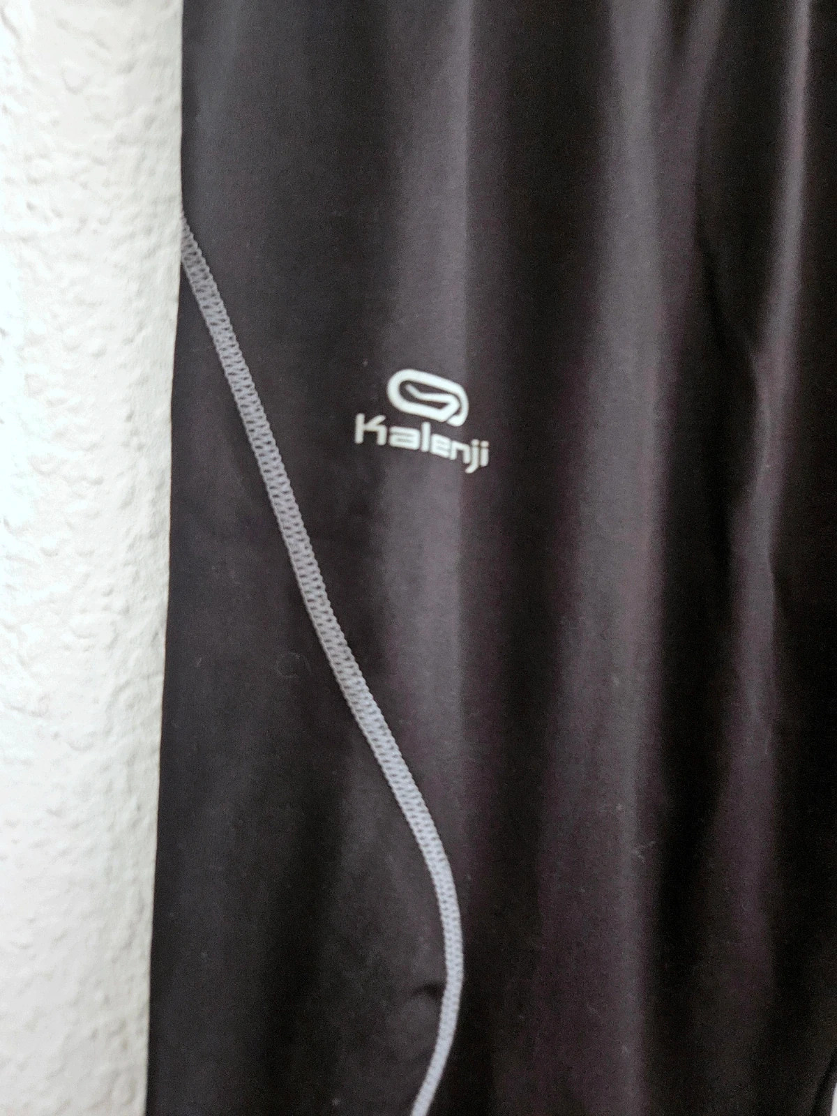 Kalenji black running leggings · Size XL · Technical fit · Reflective detail – taille XL / 42 / 14 2