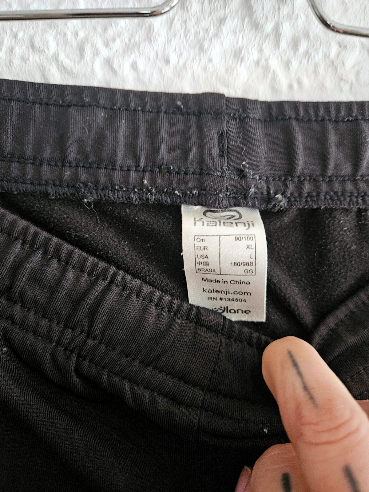 Kalenji black running leggings · Size XL · Technical fit · Reflective detail – taille XL / 42 / 14 3