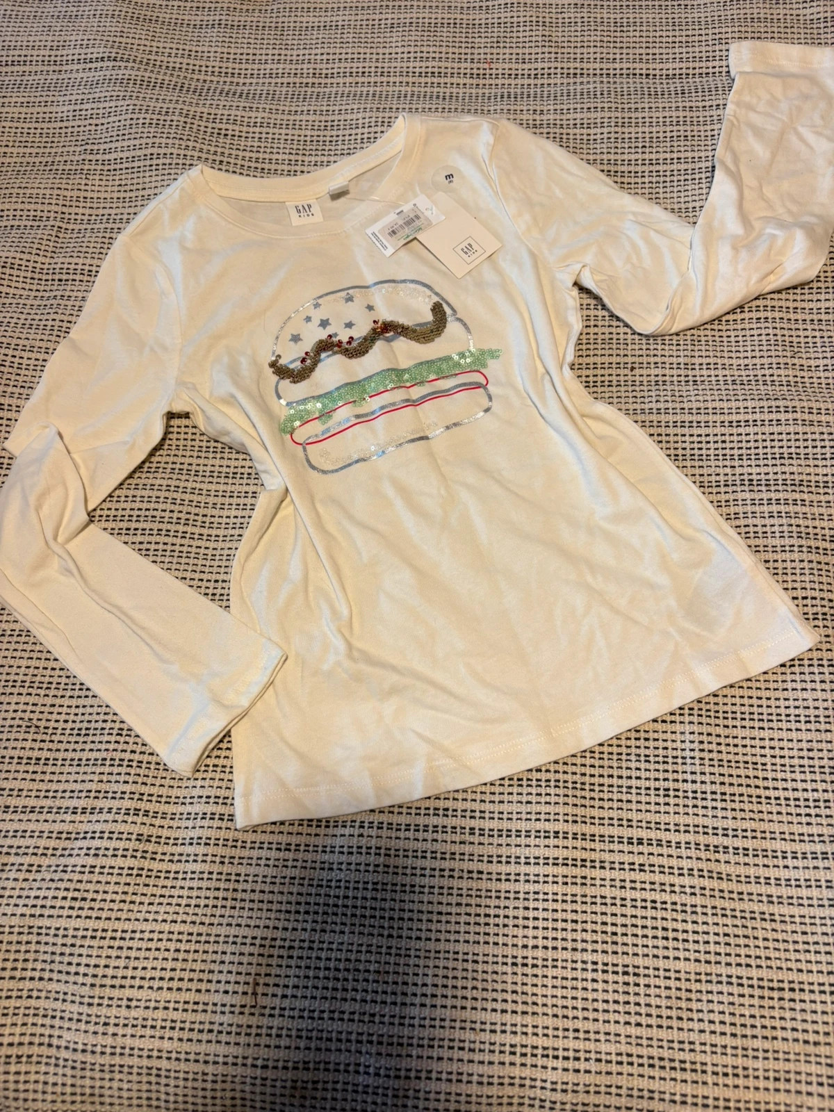 camiseta infantil de manga larga de la marca Gap talla 8 años