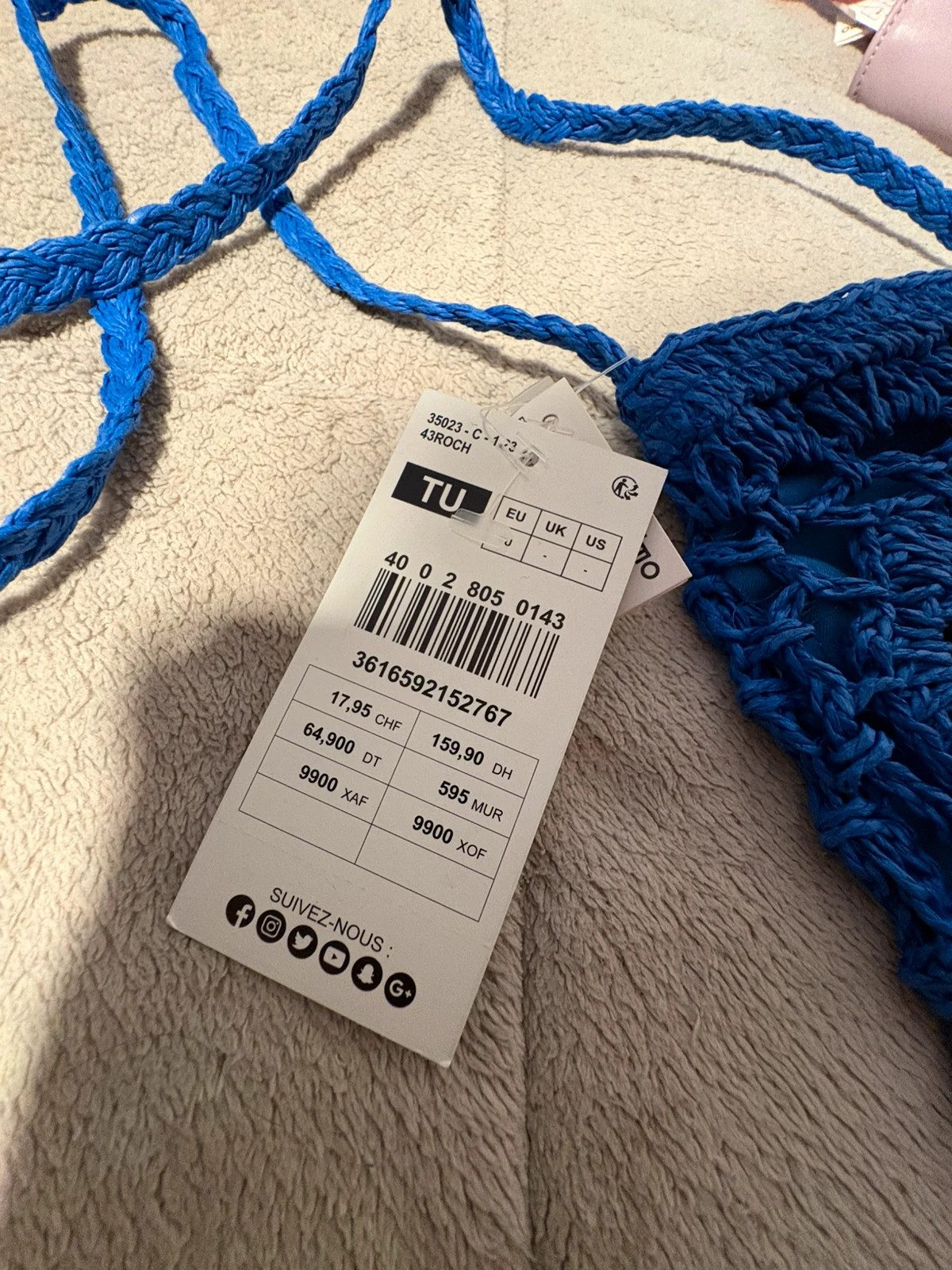 Bolsito o porta móviles azul crochet con pompones (amoi.c) – Gémo 2