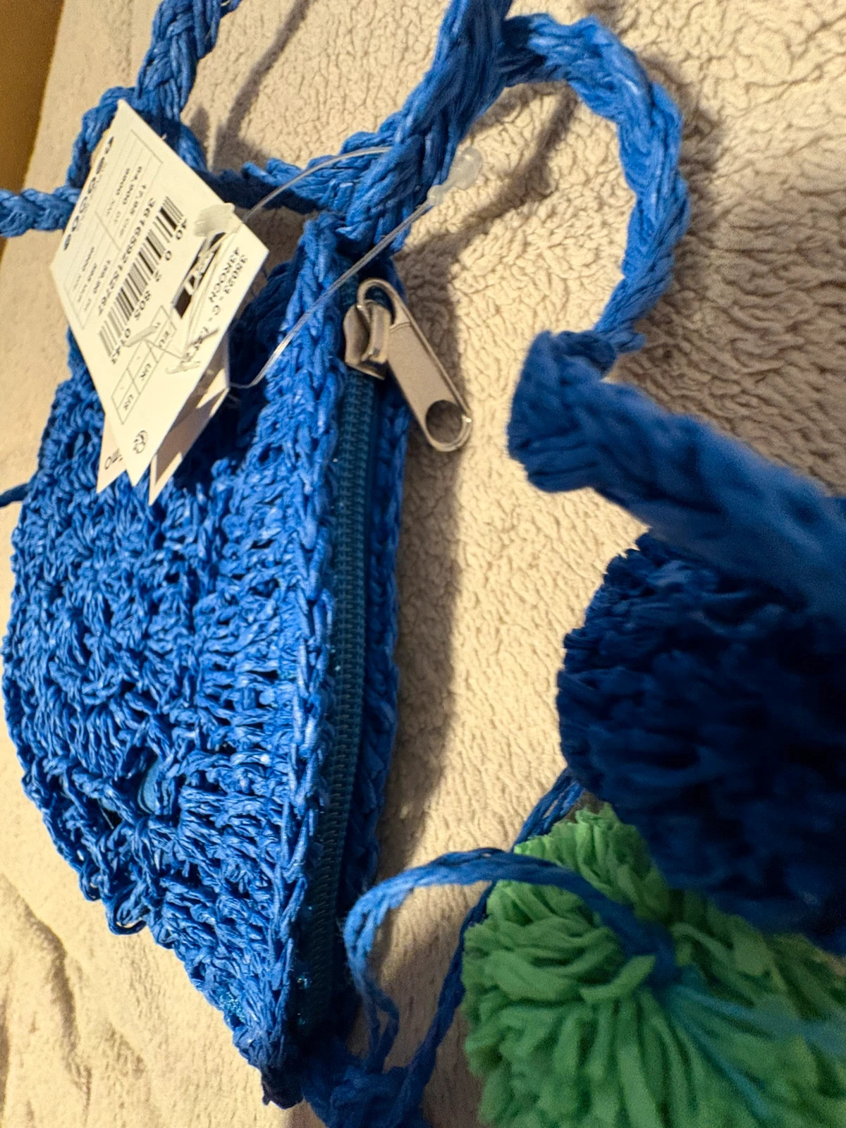 Bolsito o porta móviles azul crochet con pompones (amoi.c) – Gémo 4