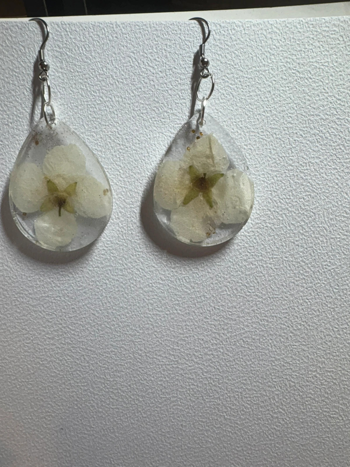 Pendientes flor de Filadelfo (amoi) – Mano 3