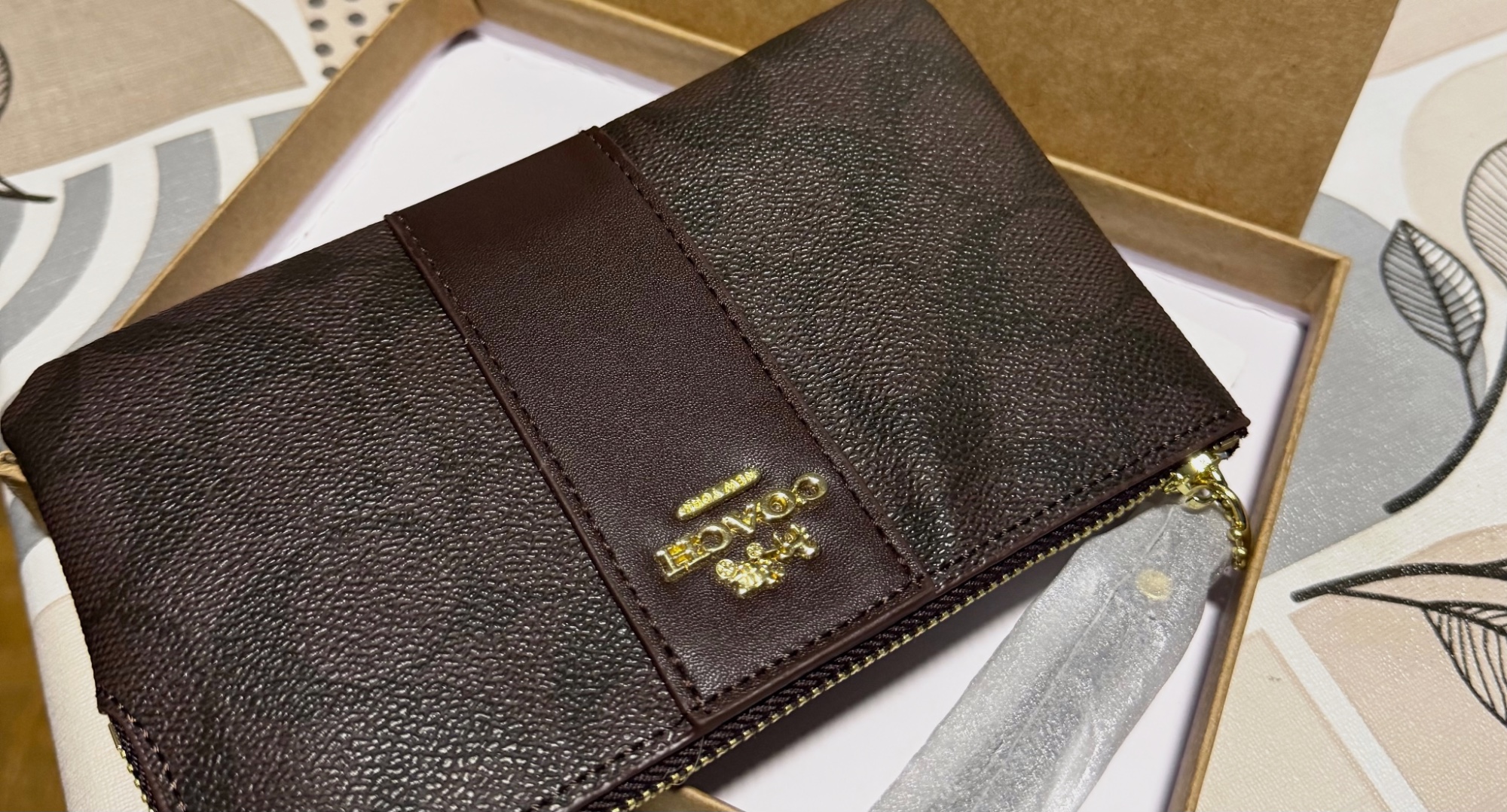 Pochette coach 