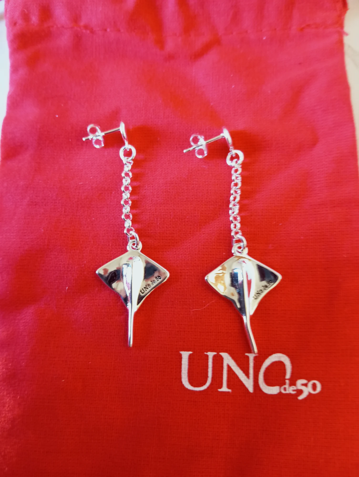 Pendientes peces Uno de 50