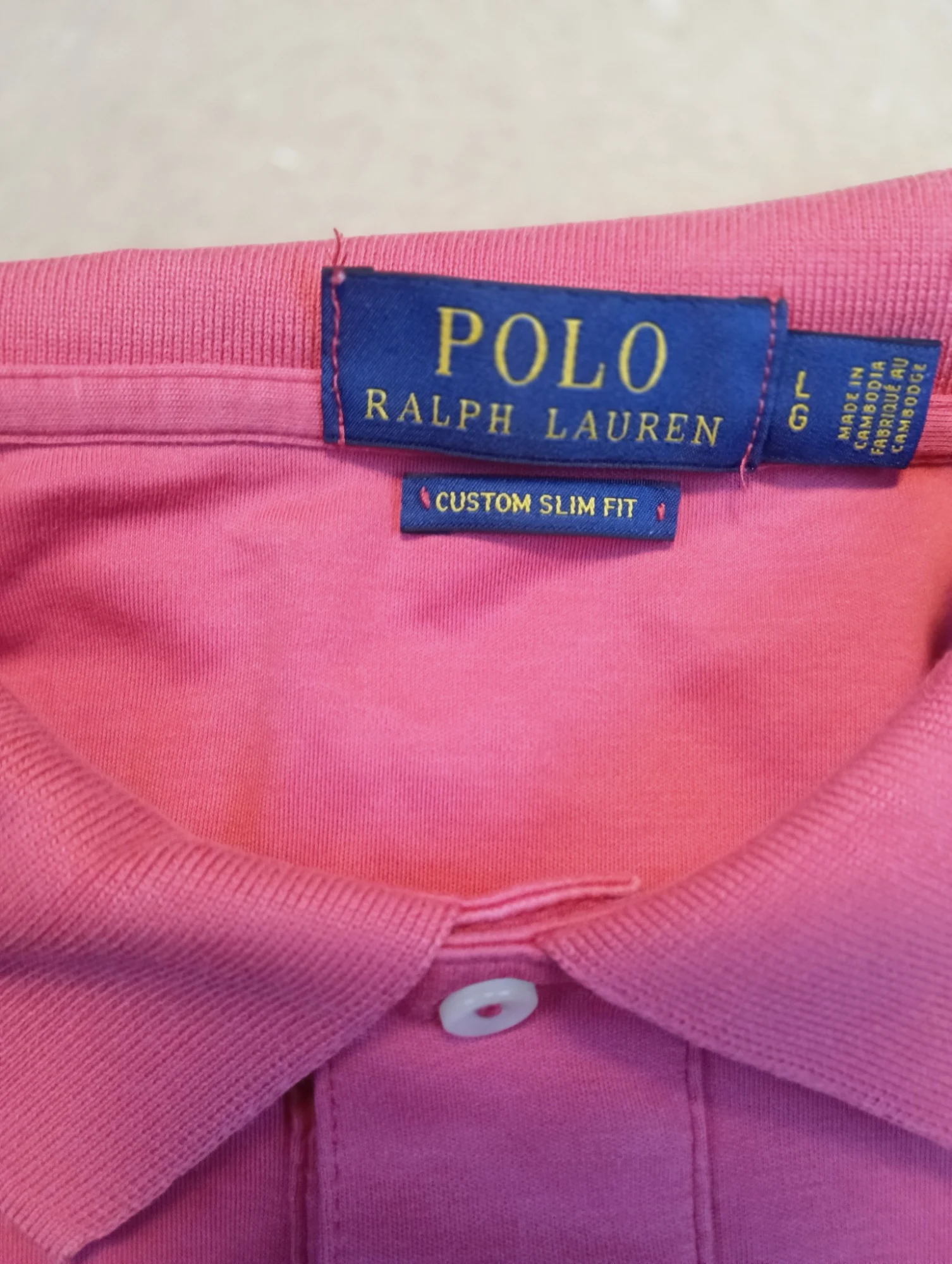Polo rose Ralph Lauren manches courtes taille L