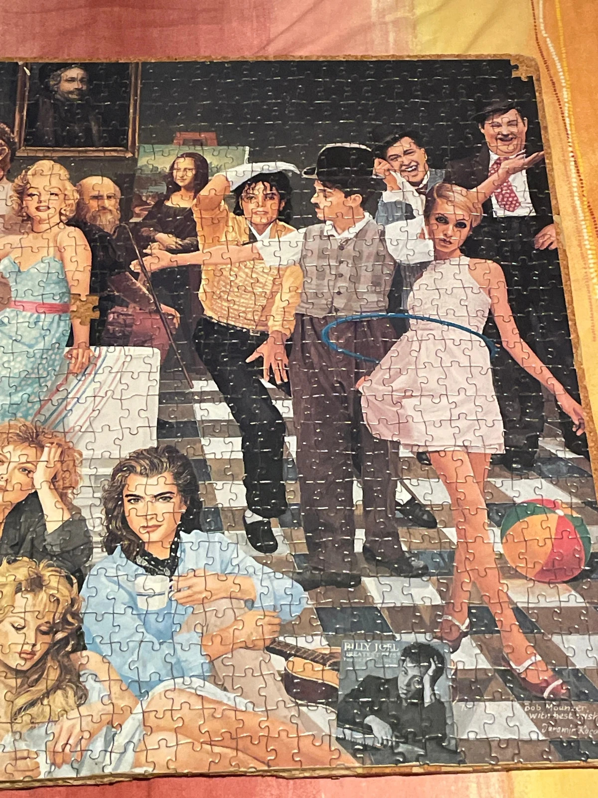 Corcho con puzzle de cantantes y actores – Ideal 3