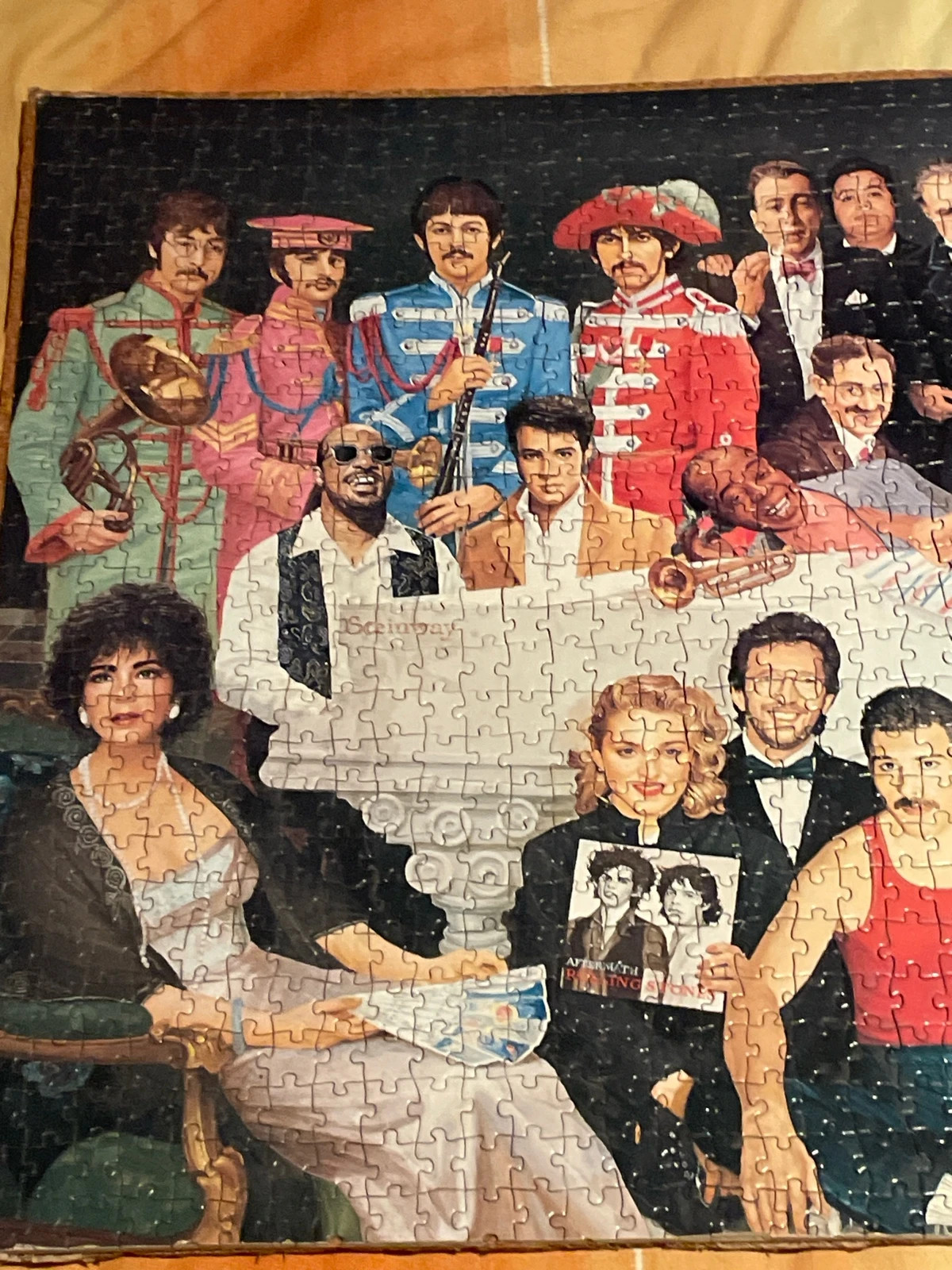 Corcho con puzzle de cantantes y actores – Ideal 5